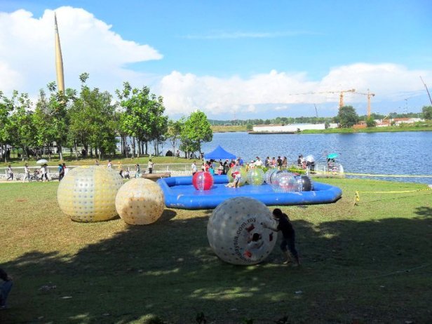 Zorbing balls during the annual Hot Air Balloon Festival in Putrajaya, Malaysia. Zorbing balls during the annual Hot Air Balloon Festival in Putrajaya, Malaysia.