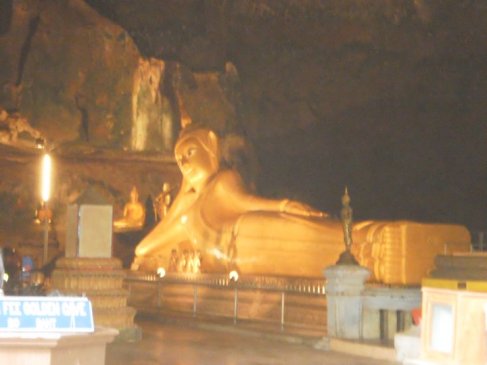 the giant buddha inside Wat Tham (meaning cave temple) Suwan Kuha, located in Phang Nga province, North of Phuket
