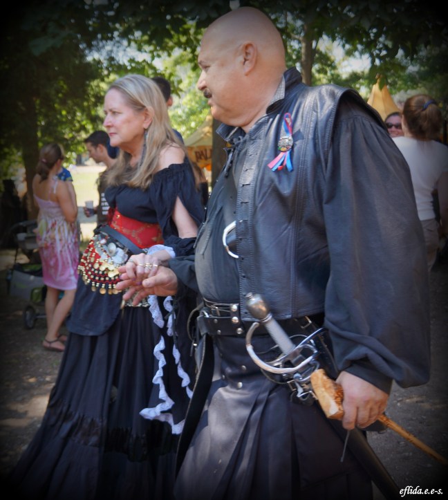 A couple enjoying Michigan Renaissance Faire.
