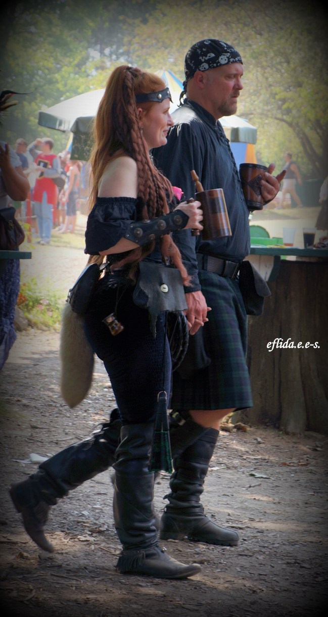 A couple enjoying the Michigan Renaissance Faire.