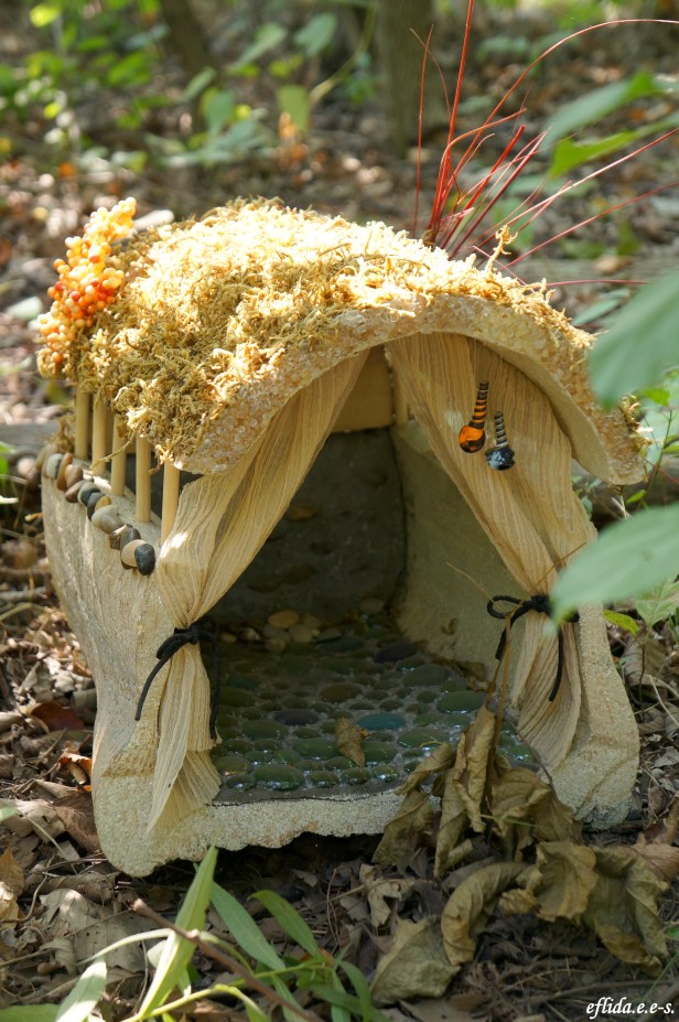 A fairy house with floor marbles at Michigan Renaissance Faire 2012.