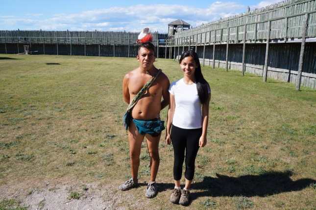 With an actor playing as a Native American at Fort Michilimackinac, Michigan.