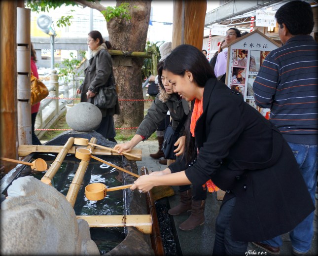 Temizuya is where people rinse their mouth and hands with water in ritual purification during hatsumode in Futenma Shrine, Ginowan, Okinawa, Japan. Temizuya is where people rinse their mouth and hands with water in ritual purification during hatsumode in Futenma Shrine, Ginowan, Okinawa, Japan.