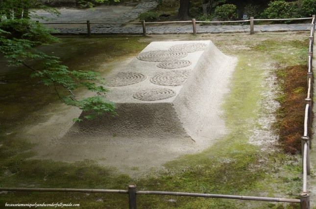 Closer view of Byakusadan 白砂壇, a raked mound of sand at Honen-in Temple in Kyoto, Japan. It symbolizes water that cleans the body and mind. Patterns on the top of the mounds are changed every four to five days.