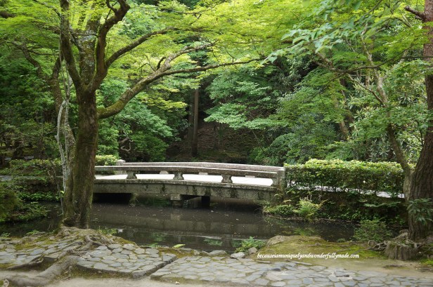 The stone bridge over Hojo-ike pond at Honen-in Temple in Kyoto, Japan.