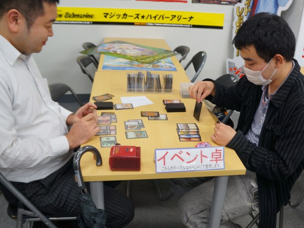 A glimpse of some Otakus playing cards inside one of the shops at Akihabara in Tokyo, Japan. A glimpse of some Otakus playing cards inside one of the shops at Akihabara in Tokyo, Japan.