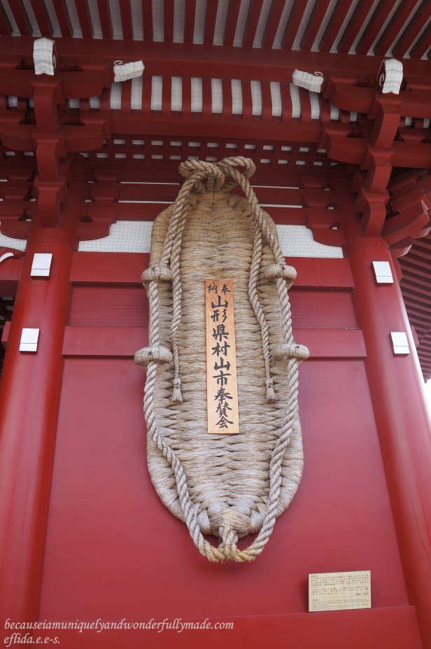 The giant O-Waraji or straw slipper that hangs on the side of the Hozomon Gate at Senso-ji Temple in Tokyo, Japan. It was made by 800 citizens of Murayama City in a month and was devoted to Sensoji to charm against bad spirits. The giant O-Waraji or straw slipper that hangs on the side of the Hozomon Gate at Senso-ji Temple in Tokyo, Japan. It was made by 800 citizens of Murayama City in a month and was devoted to Sensoji to charm against bad spirits.