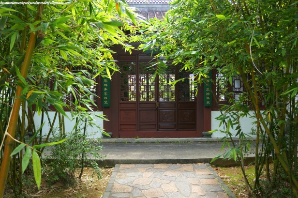 One of the entrances to a building covered in bamboo at Fukushuen Garden 福州園 in downtown Naha 那覇市 Okinawa 沖縄本島, Japan 日本国.