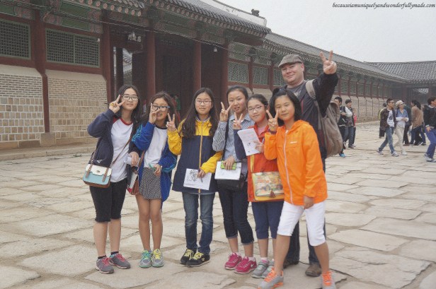 Korean kids being friendly to my husband at Gyeongbokgung Palace 경복궁 in Seoul, South Korea.