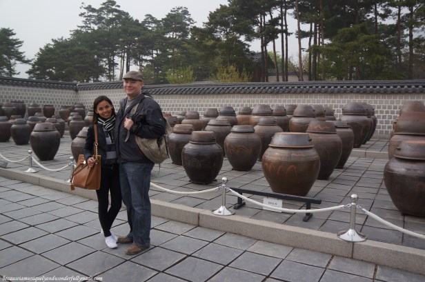Behind us are fermented soy paste in clay pots at Gyeongbokgung Palace 경복궁 in Seoul, South Korea.