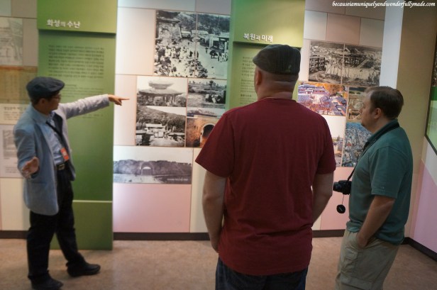 Hubby and our friend JT listening attentively to our Korean tour guide Mr.Mark as he explains the construction details of Hwaseong Fortress inside Suwon Hwaseong Museum (수원화성박물관) 궁 in Suwon 수원, South Korea.