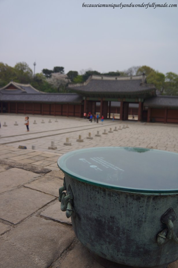 The big bowls on top of the stone platform in front of the Injeongjeon Hall at Changdeokgung Palace 창덕궁 complex are called Deumeu 드므 and were meant to put out fire.