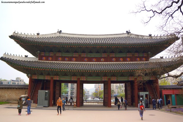 View of Donhwamun Gate 돈화문 looking out from the inside of Changdeokgung Palace 창덕궁 complex in Seoul, South Korea.