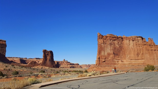 The Courthouse Towers Viewpoint at Arches National Park in Utah is where the famous rock formations called Three Gossips, Sheep Rock, the Organ, and the Tower of Babel can be viewed closely.