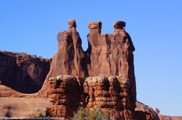 A closer view of the famous rock formation called The Three Gossips from The Courthouse Towers Viewpoint in Arches National Park in Utah.