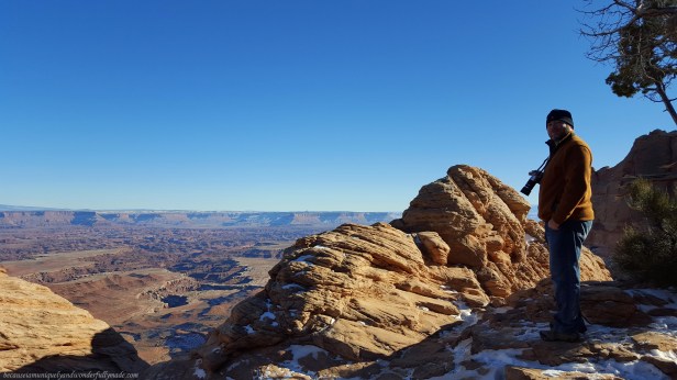 Looking down to the canyon floor from the side of the Mesa Arch at Canyonlands National Park in Moab, Utah.