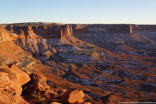 The bright orange sandstone cliffs of Canyonlands National Park as viewed from Green River Overlook in sunset. 