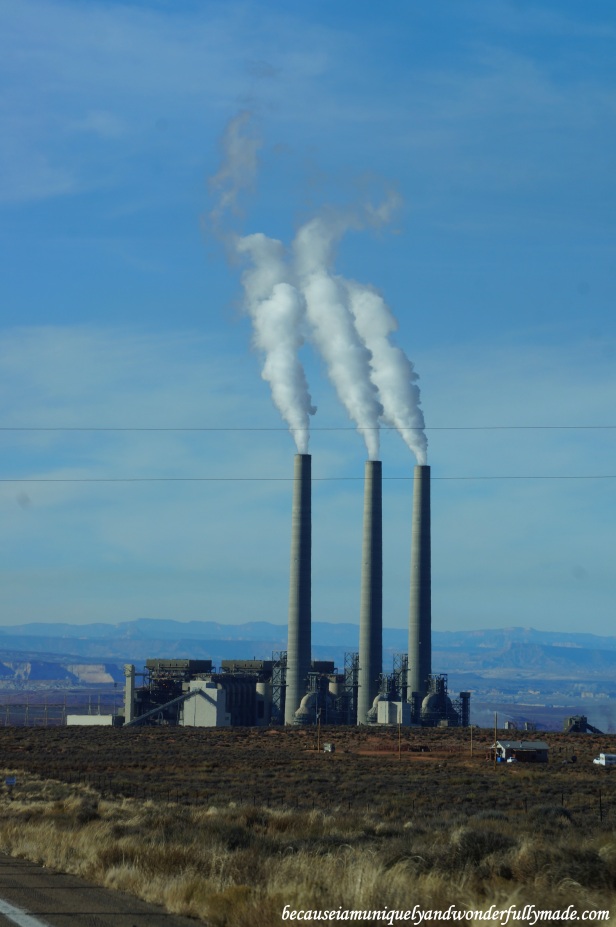 The Navajo Generating Station is a 2250 megawatt net coal-fired power plant located in this Navajo Indian Reservation in Page, Arizona. Its three tall flue gas stacks, as tall as 775 ft (236 meter) and listed among the tallest structures in Arizona, can be seen even from miles and miles away.