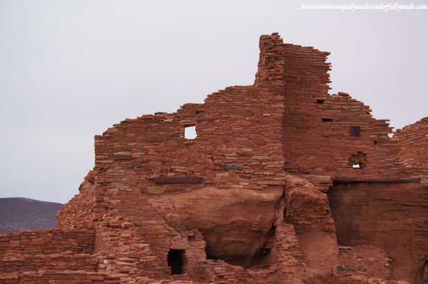 Wupatki pueblo is constructed from blocks of the local sandstone which explains its red color.