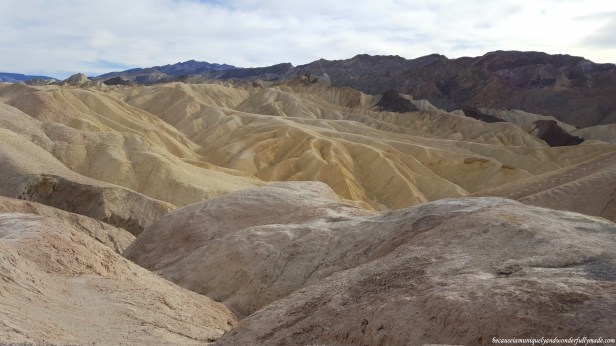 The landscape surrounding Zabriskie Point at Death Valley National Park was formed by sediment from a dried-up lake.